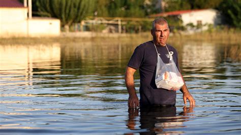 Greek authorities evacuate another village as they try to prevent flooding in a major city